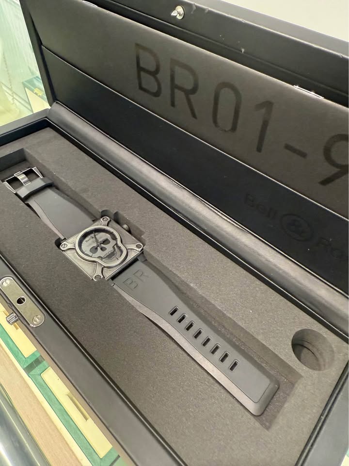 Limited Edition Bell&Ross PVD steel case, a black rubber strap, and a black compass dial