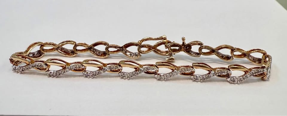 Natural Diamonds Infinity 10k Yellow Gold 7.5” Bracelet 1.00CTW