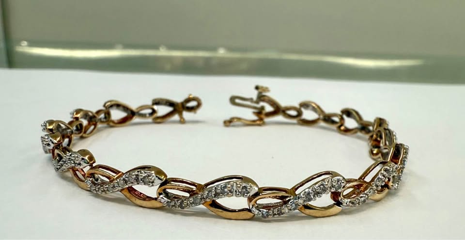Natural Diamonds Infinity 10k Yellow Gold 7.5” Bracelet 1.00CTW