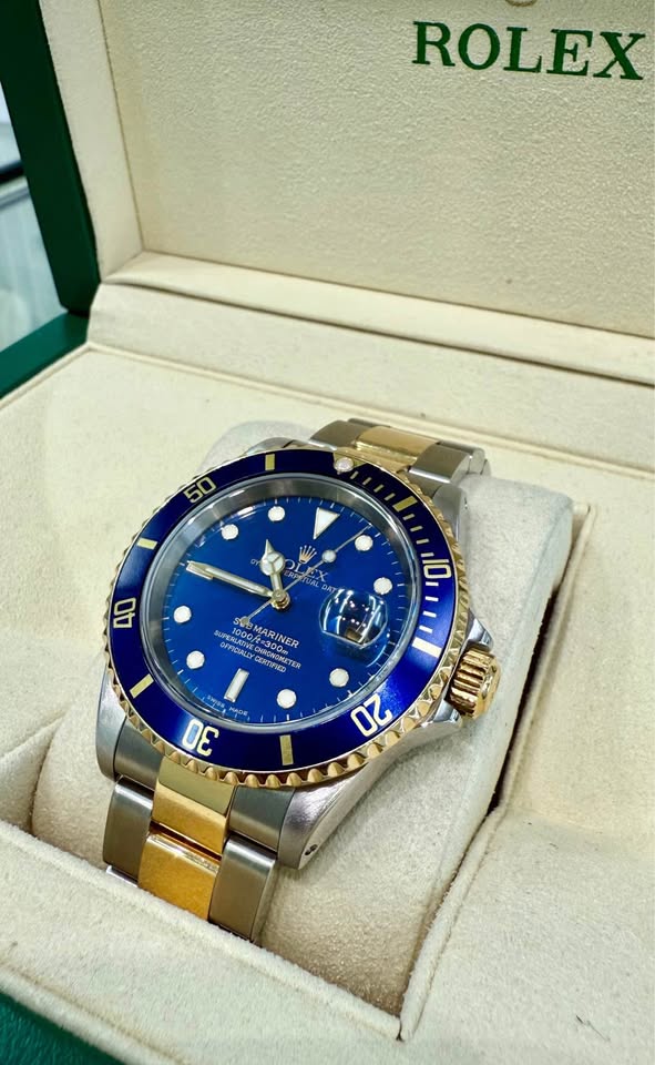 Rolex Pre-Owned Submariner “Bluesy” 18K Yellow Gold / Steel Oyster Blue Bezel Box and Papers