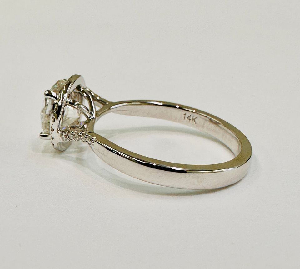 Stunning 1.70CTW , Twist Halo Engagement Ring in 14Karat Gold