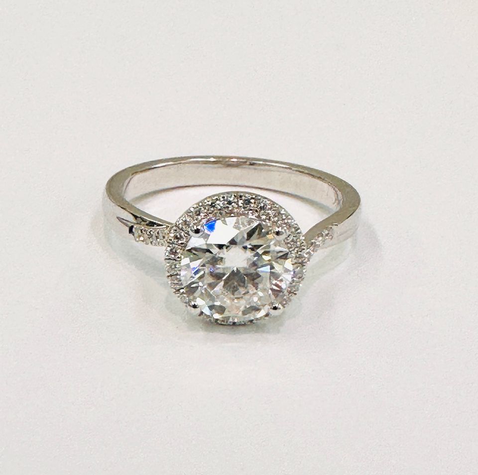 Stunning 1.70CTW , Twist Halo Engagement Ring in 14Karat Gold