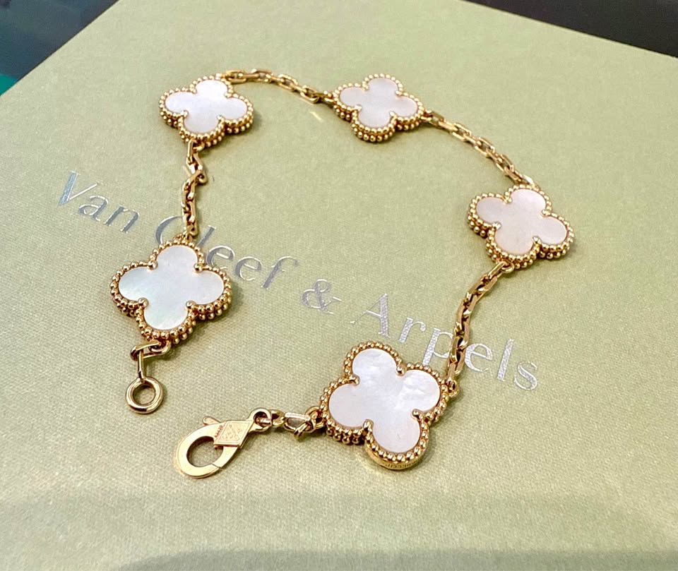 Van Cleef & Arpels 18k , 5 Motifs Mother of Pearl Alhambra Bracelet with all paperwork VCARA41800